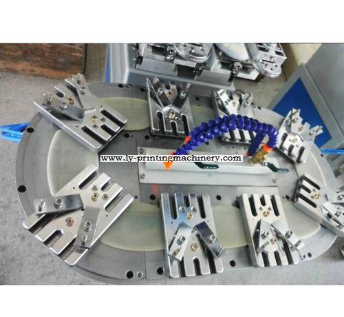 Two color closed ink cup pad printer with conveyor belt
